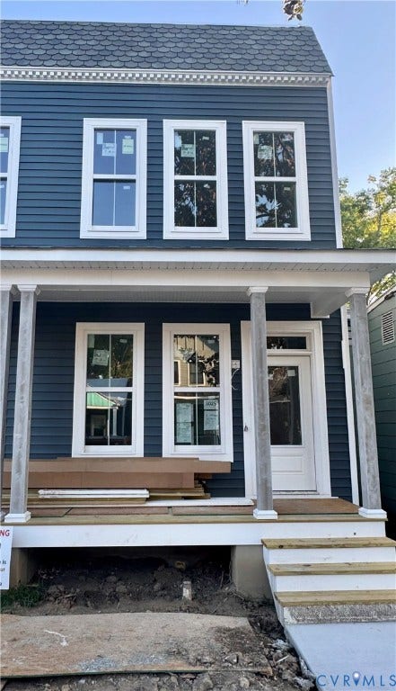 3025 Grayland Ave, Richmond, VA 23221 Two-story exterior with horizontal siding and a gambrel roof
