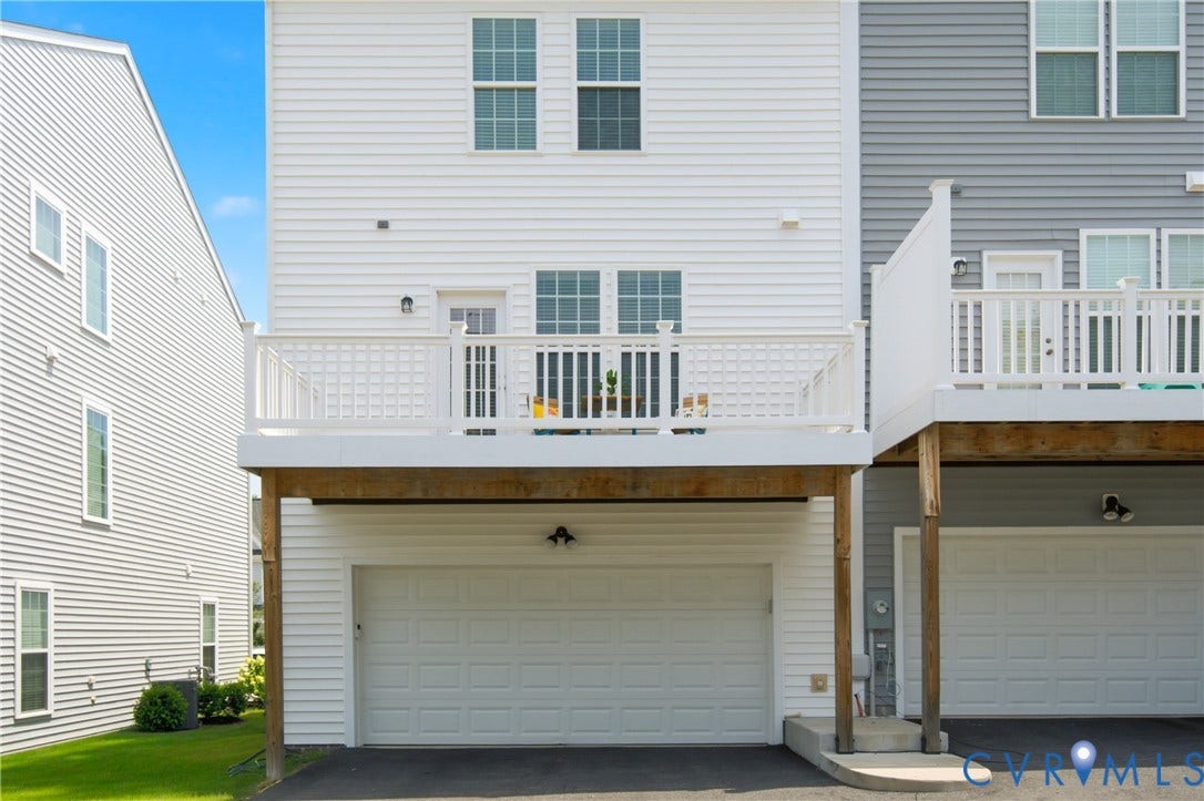 Rear with 2 car garage