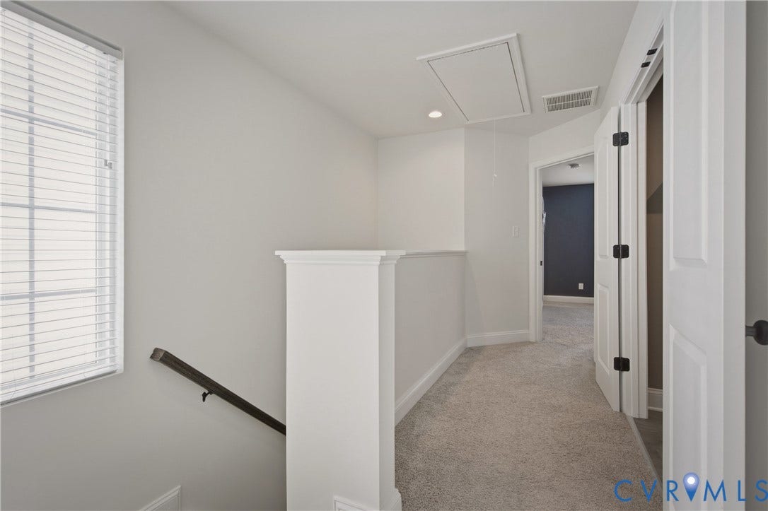 Stairs to 3rd floor and hallway