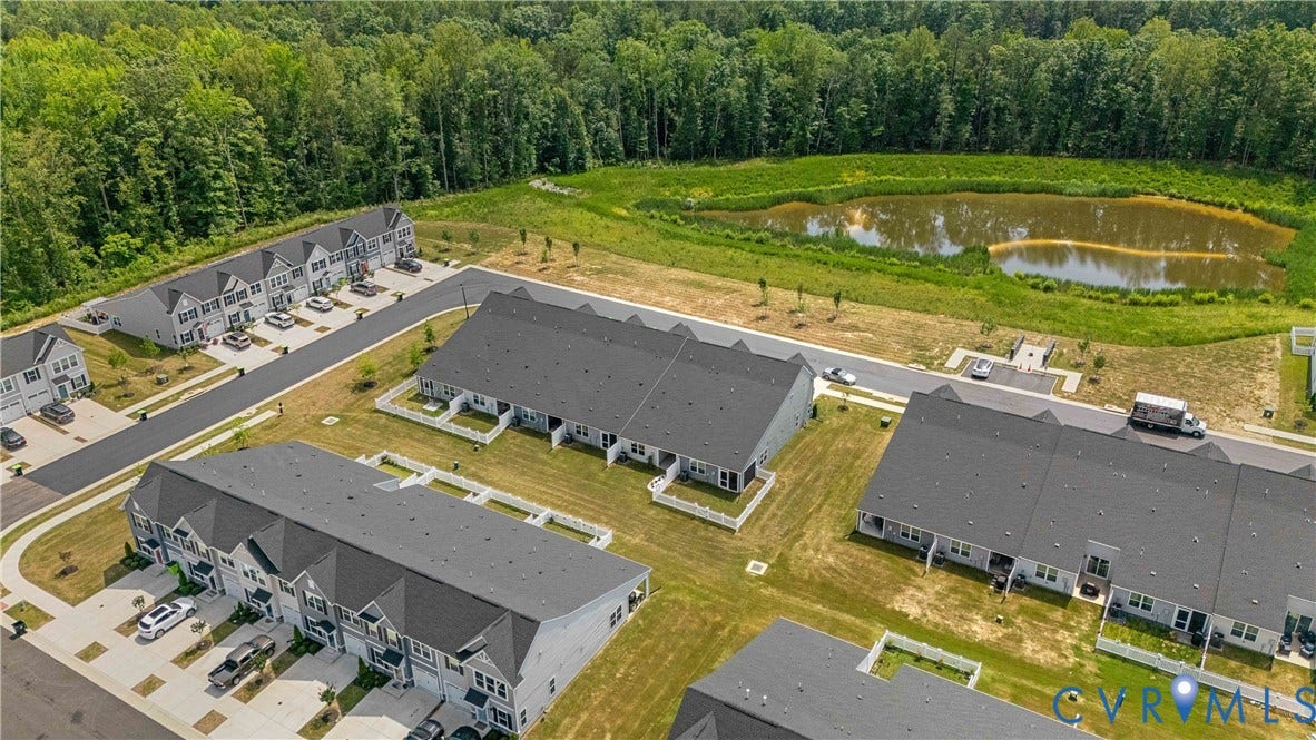 7213 Lyon Taylor Lane, Summer Maple, New Kent, VA 23124 Modern townhome community featuring multiple buildings with dark gray roofing