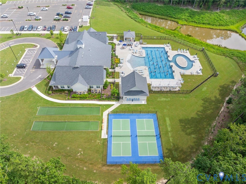 7213 Lyon Taylor Lane, Summer Maple, New Kent, VA 23124 Aerial overview showcasing a comprehensive amenity center with multiple recreation options