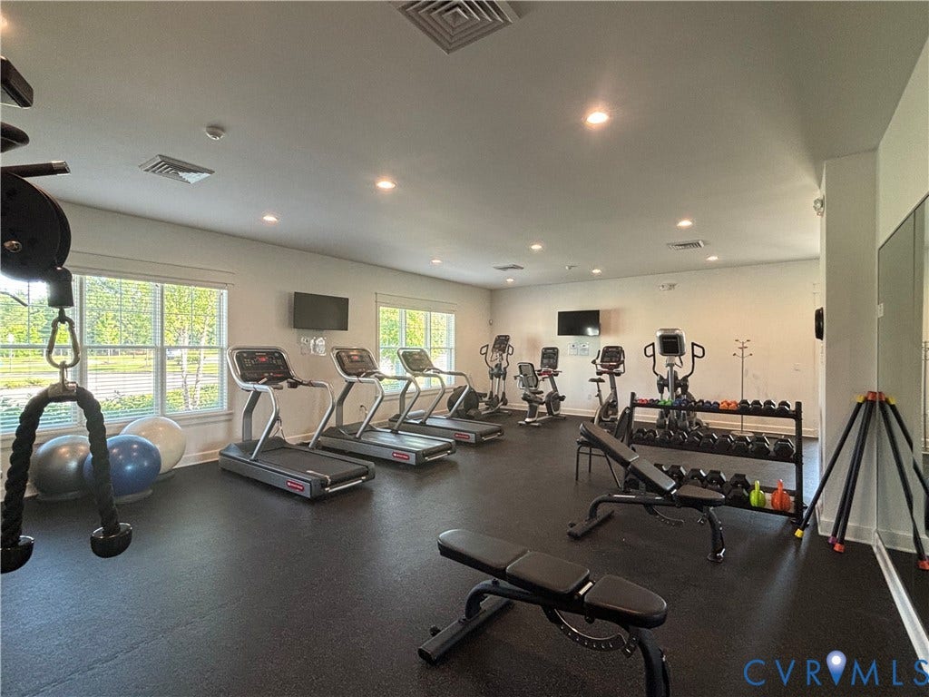 7213 Lyon Taylor Lane, Summer Maple, New Kent, VA 23124 Fitness center with recessed lighting and resilient flooring