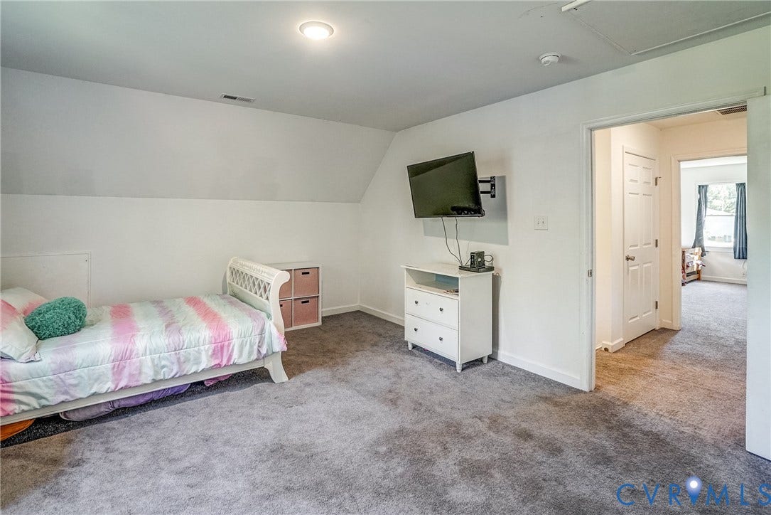 65 Hopeful Church Lane, Bumpass, VA 23024 Interior space featuring a vaulted ceiling and recessed lighting