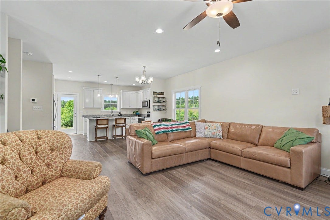 815 Kennon Road, Northeast Creek Reservoir Subd, Mineral, VA 23117 Spacious living area with wood-finish flooring and recessed lighting
