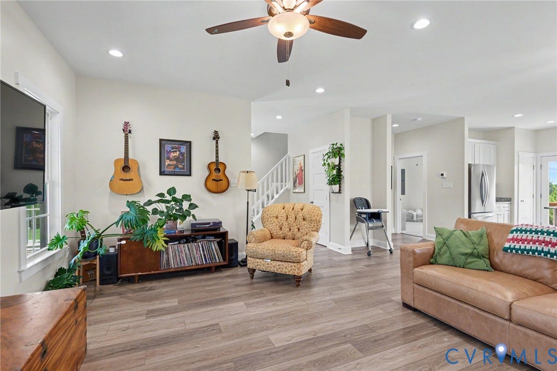 815 Kennon Road, Northeast Creek Reservoir Subd, Mineral, VA 23117 Spacious living area featuring wood-finish flooring, recessed lighting, and a ceiling fan