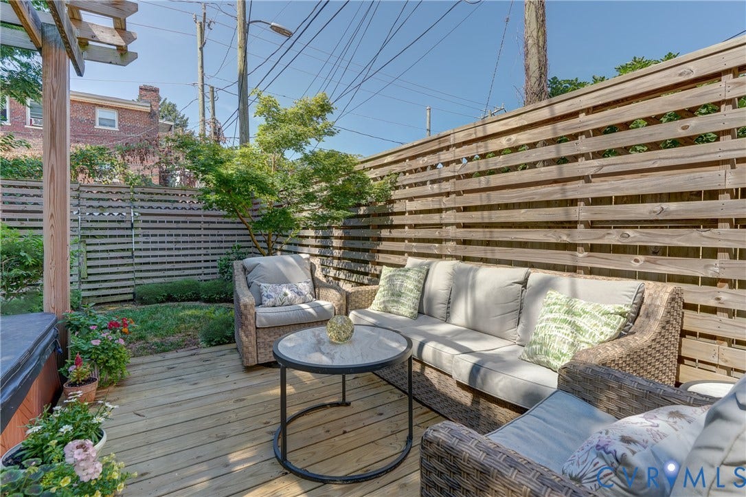 2619 Grayland Avenue, Byrd Park/Upper Fan, Richmond, VA 23220 Wood deck with slatted wood fencing, featuring a pergola structure