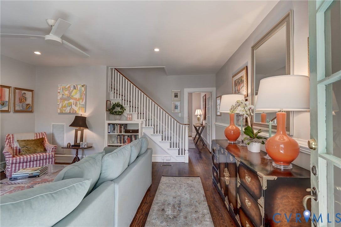 2619 Grayland Avenue, Byrd Park/Upper Fan, Richmond, VA 23220 Hardwood flooring extends throughout this interior space featuring a staircase with white balusters, recessed lighting, and a ceiling fan