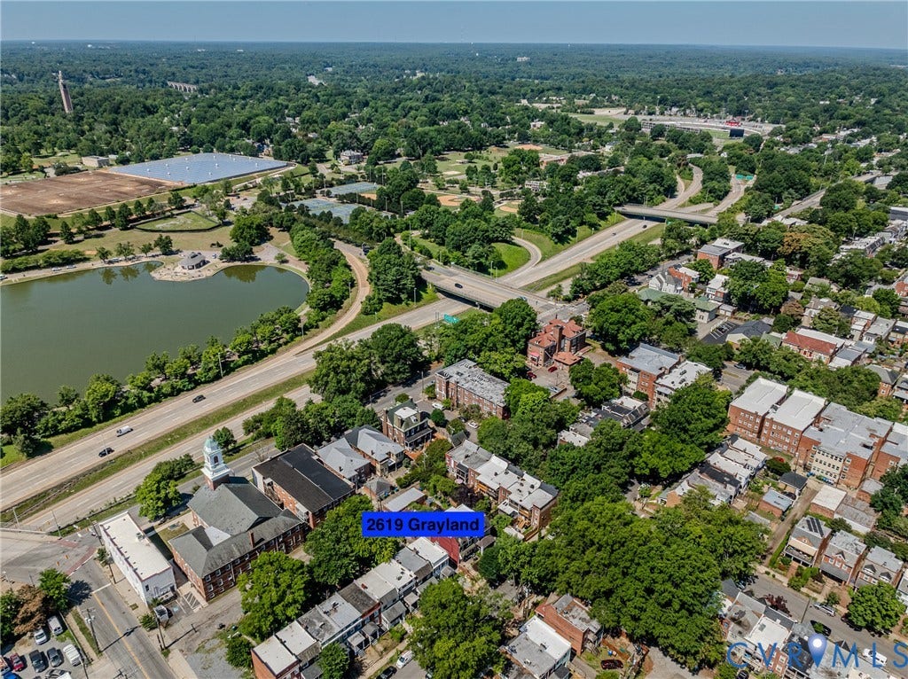 2619 Grayland Avenue, Byrd Park/Upper Fan, Richmond, VA 23220 Aerial perspective showcasing the surrounding neighborhood, extensive green spaces, and proximity to Byrd Park lake