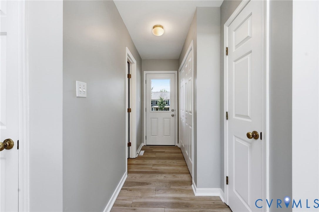 9500 Mesquite Road, Glen Allen, VA 23060 Hallway with wood-finish flooring and light gray walls