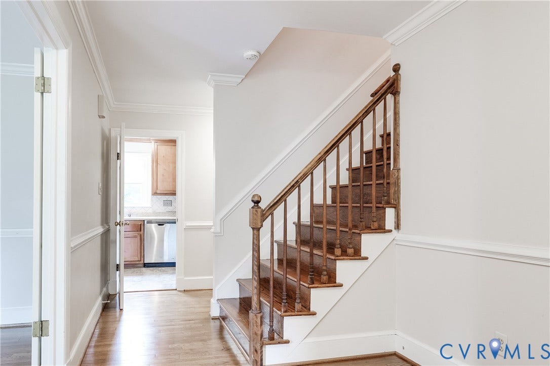 3924 Belspring Road, Chester, VA 23831 Hardwood staircase with turned newel post and balusters, crown molding, chair rail, and baseboard trim