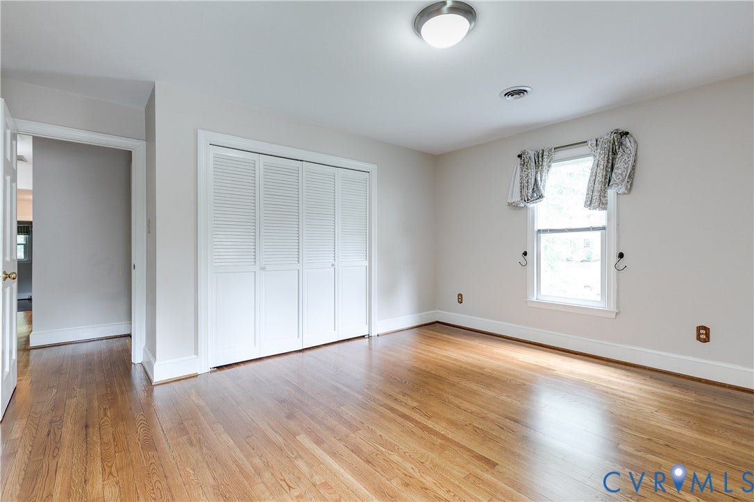 3924 Belspring Road, Chester, VA 23831 Hardwood flooring throughout, white louvered bifold closet doors, and recessed lighting