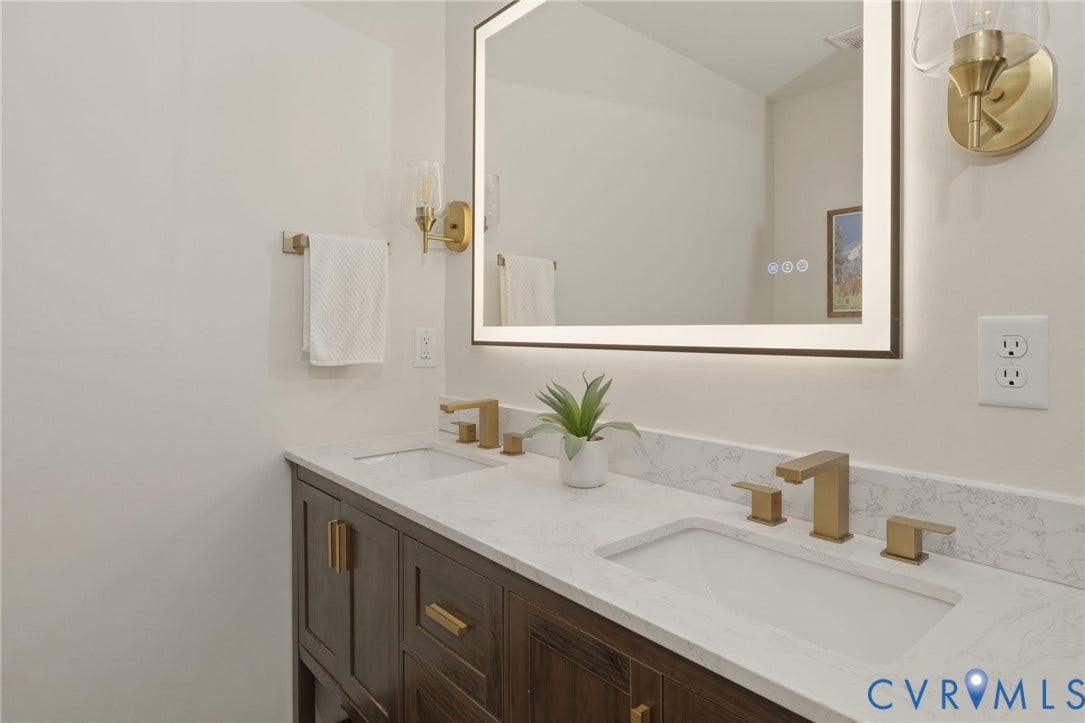 2627 Kensington Avenue, Museum District, Richmond, VA 23220 Double vanity with white countertop and integrated sinks