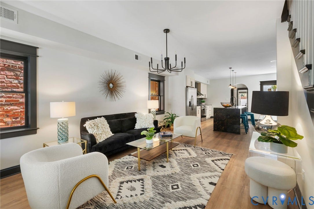 2627 Kensington Avenue, Museum District, Richmond, VA 23220 Open concept living area featuring light wood-finish flooring, white walls, and dark trim