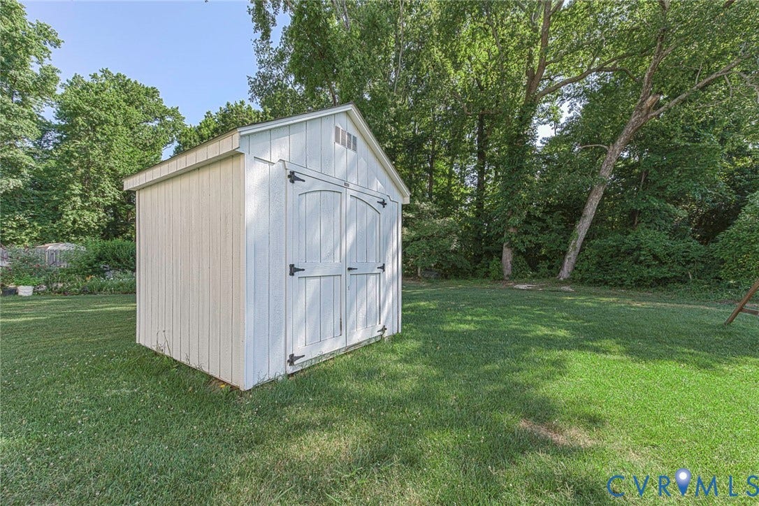 1900 Brilland Court, Glen Allen, VA 23060 Detached storage shed with white siding and double arched doors