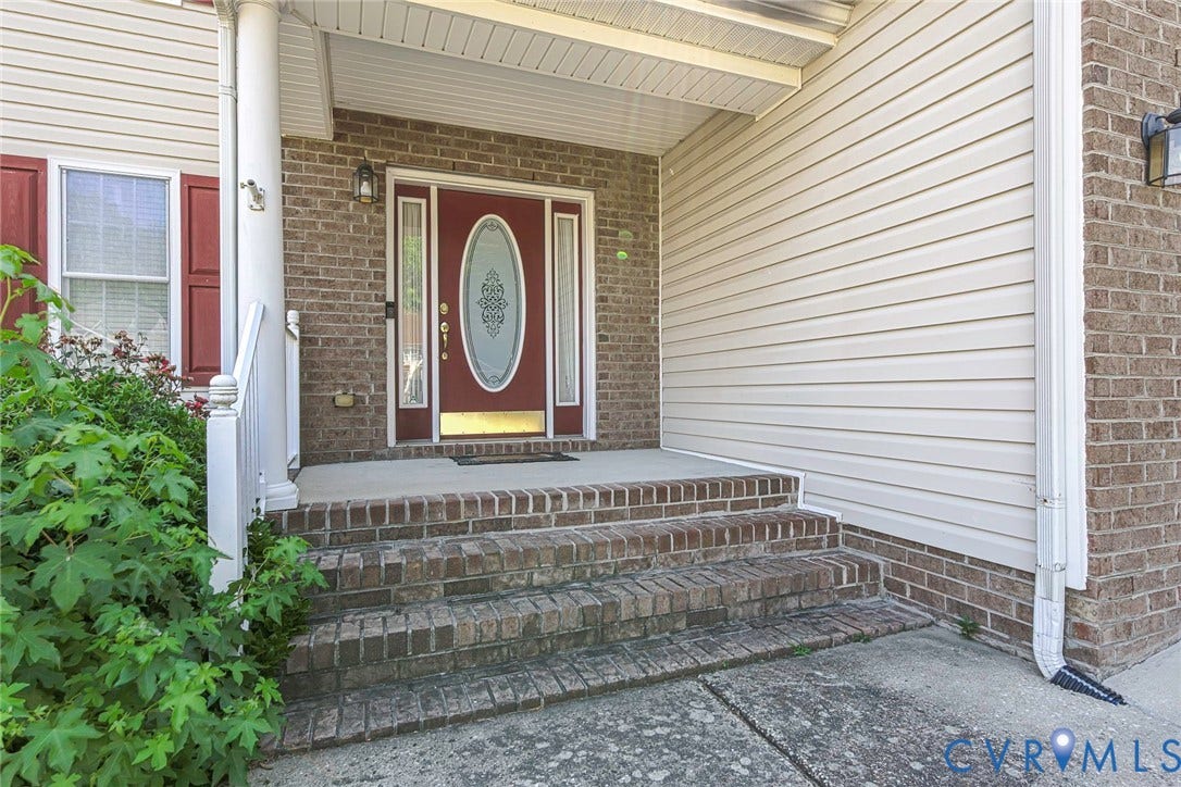 1900 Brilland Court, Glen Allen, VA 23060 Brick and siding exterior featuring a covered entry porch