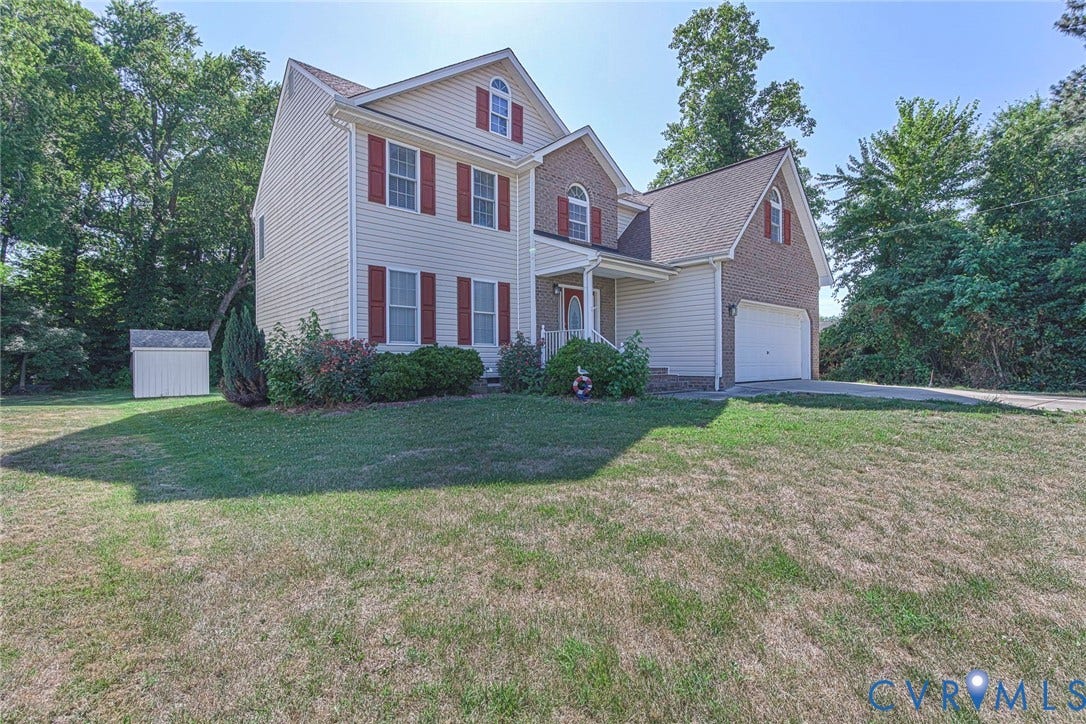 1900 Brilland Court, Glen Allen, VA 23060 Two-story residence featuring light-colored siding and brick accents