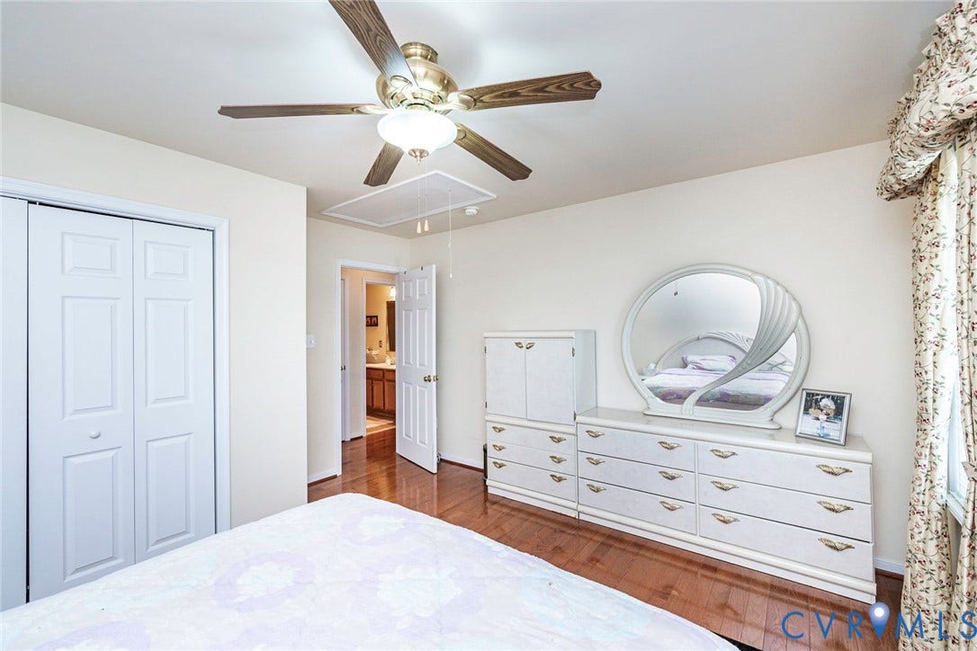1900 Brilland Court, Glen Allen, VA 23060 Bedroom 2 Bright room featuring wood-finish flooring and a ceiling fan with integrated lighting