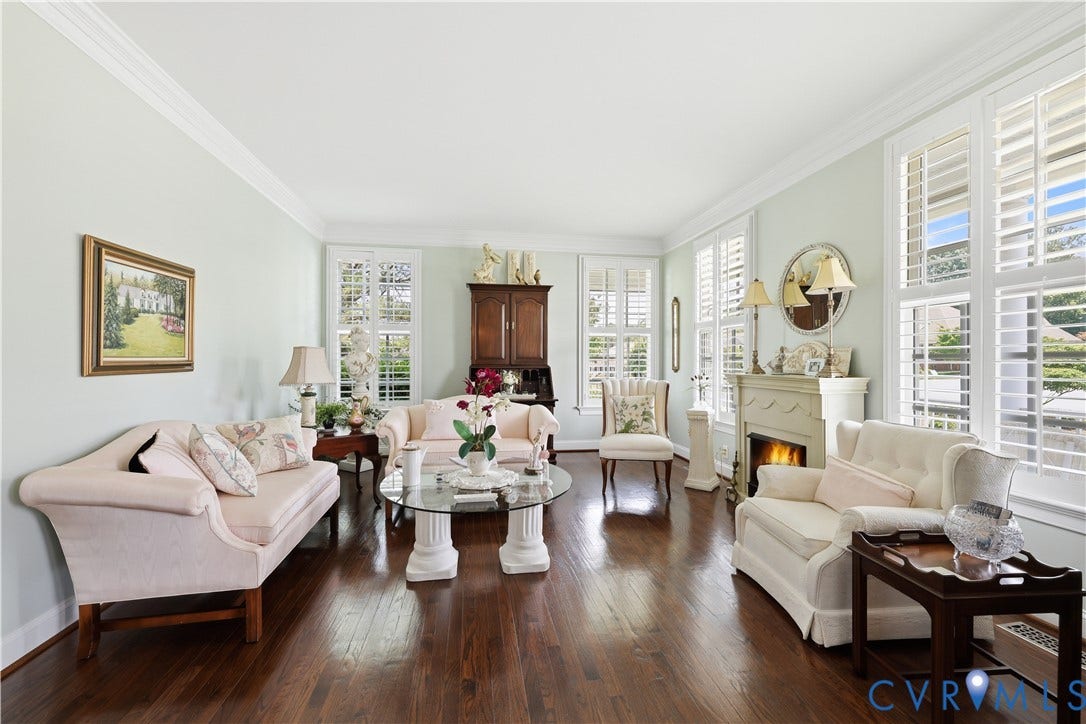 Wood floor, crown molding, great windows!