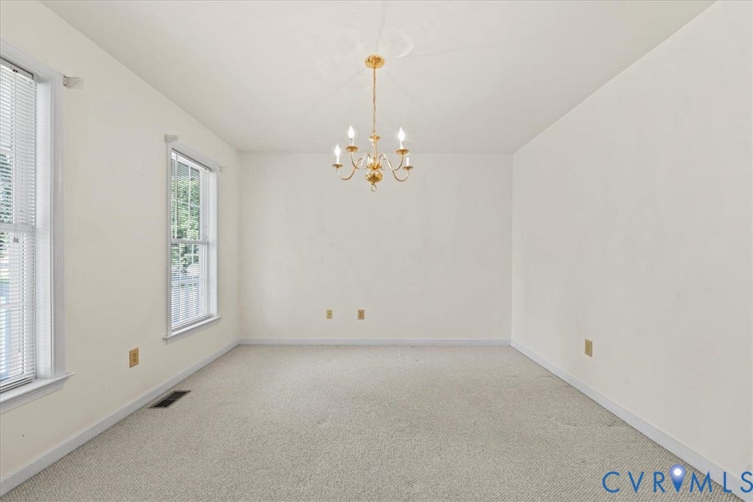 2924 Warfield Ridge Terrace, Chester, VA 23831 Spacious interior room featuring light-colored carpeting and neutral wall paint