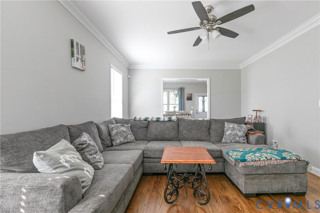 1301 Dance Street, Randolph, Richmond, VA 23220 Living space featuring light gray walls, wood-finish flooring, a ceiling fan with integrated lighting, and white crown molding