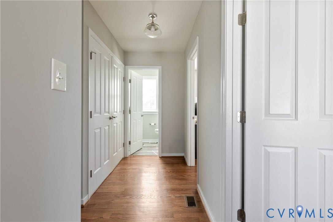 1301 Dance Street, Randolph, Richmond, VA 23220 Hallway featuring wood-finish flooring, light gray wall paint, white trim, and recessed lighting