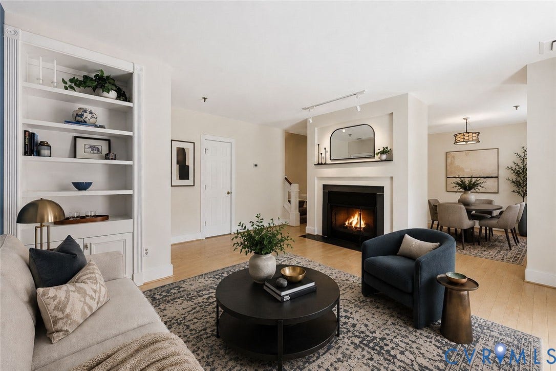 1443 Floyd Avenue, #208, The Fan, Richmond, VA 23220 Built-in bookcase, window, FP, 1/2 bath, HW floors, & closet. AI Staged.