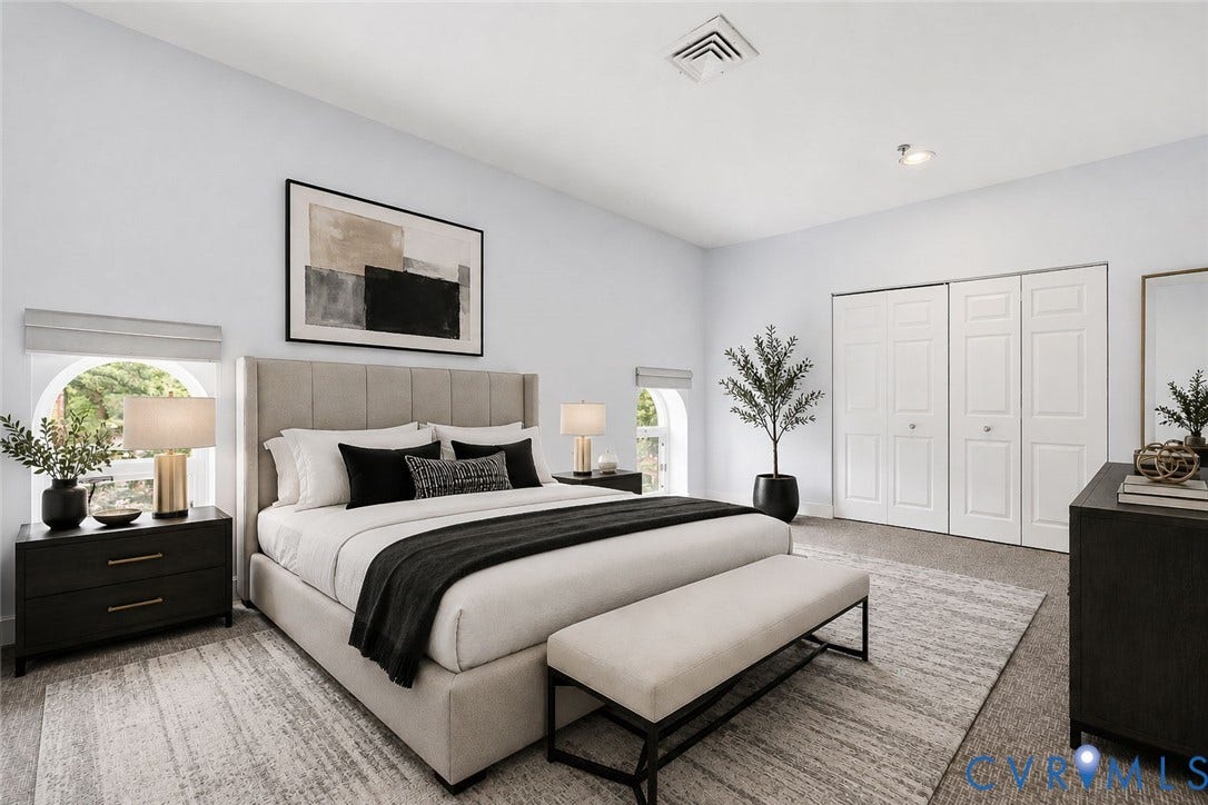 1443 Floyd Avenue, #208, The Fan, Richmond, VA 23220 Primary Bedroom w/2 windows, plush carpeting, 2 double closets, & private ensuite! AI staged.