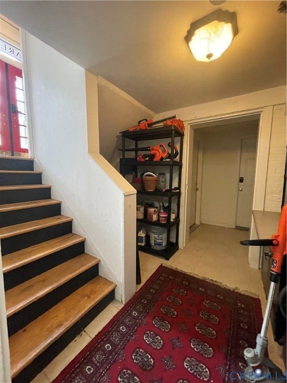View looking up Basement steps.