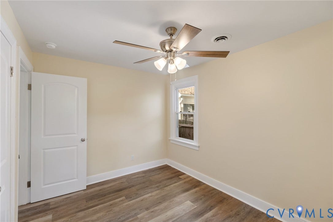 3122 Maplewood Avenue, Stadium, Richmond, VA 23221 Ceiling fan with light fixture, wood-finish flooring, white trim, recessed window, and a paneled door