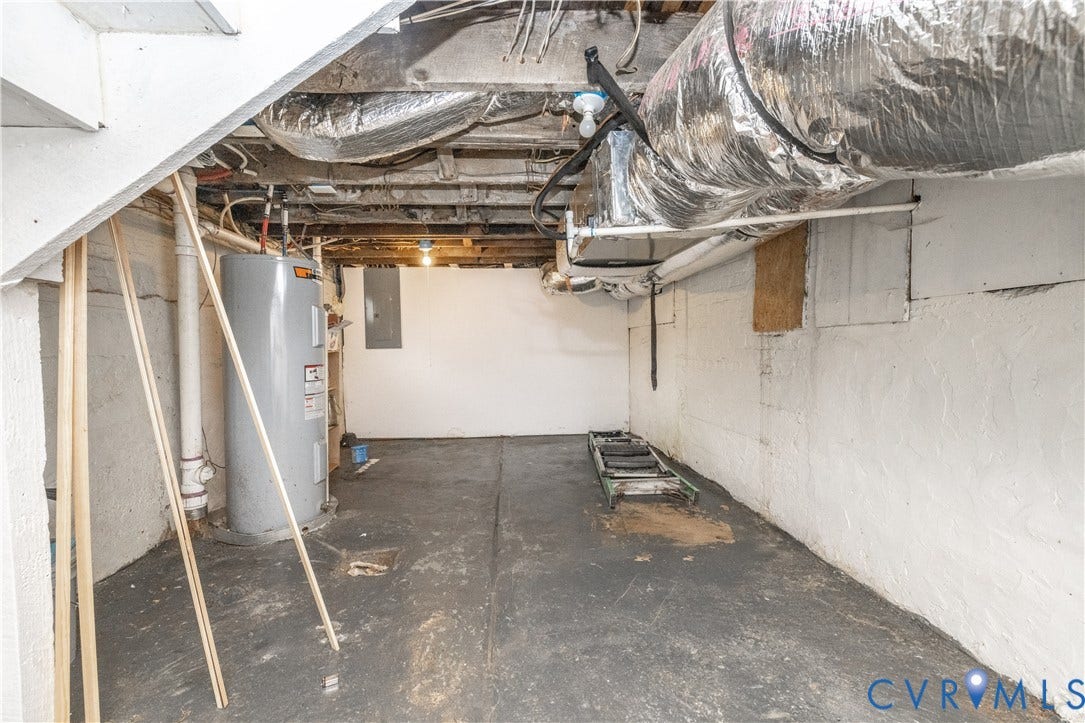 Basement utility area featuring a water heater, visible ductwork, exposed ceiling joists, white painted concrete walls, and a concrete floor