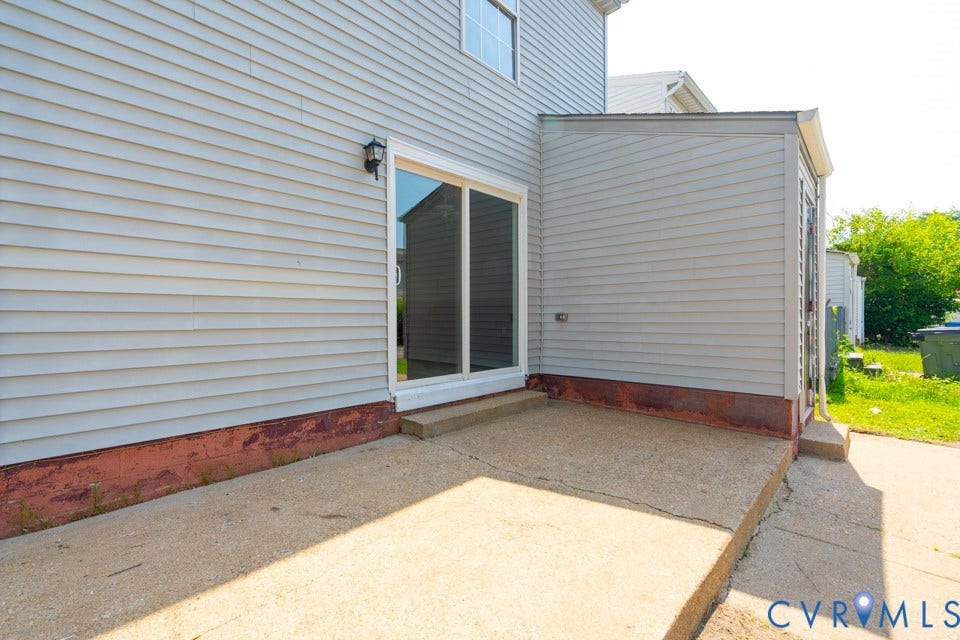 1409 Idlewood Avenue, Randolph, Richmond, VA 23220 Exterior concrete patio with direct access to interior via sliding glass door