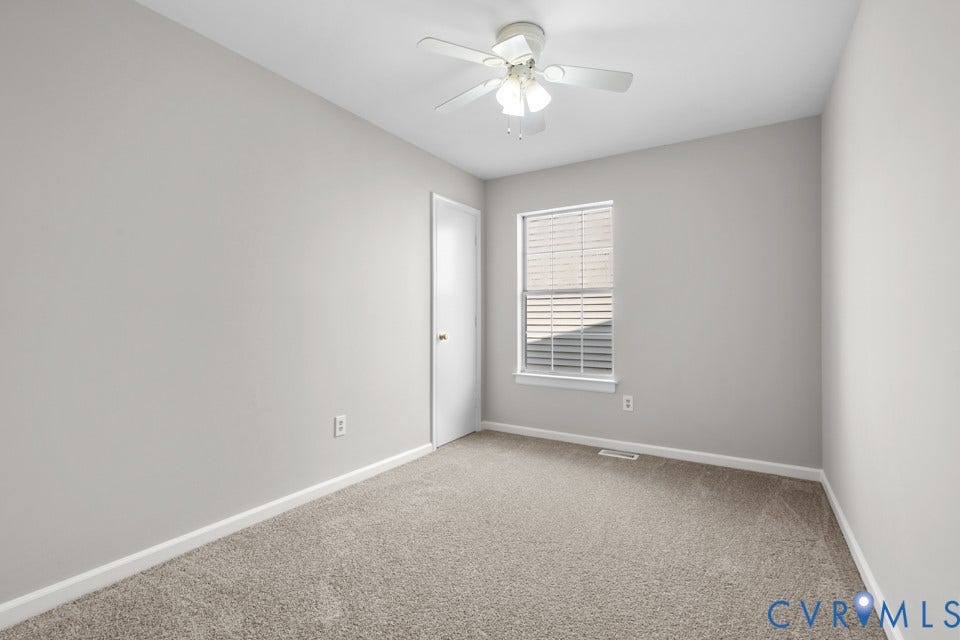 1409 Idlewood Avenue, Randolph, Richmond, VA 23220 Bedroom featuring light gray walls, neutral carpet flooring, a single window with blinds, a white ceiling fan with integrated lighting, and a white interior door