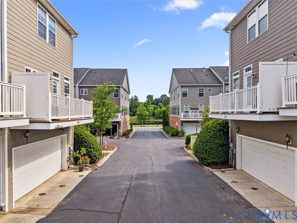 3806 Pumpkin Seed Lane, West Broad Village, Glen Allen, VA 23060 garage to the left, pond directly ahead