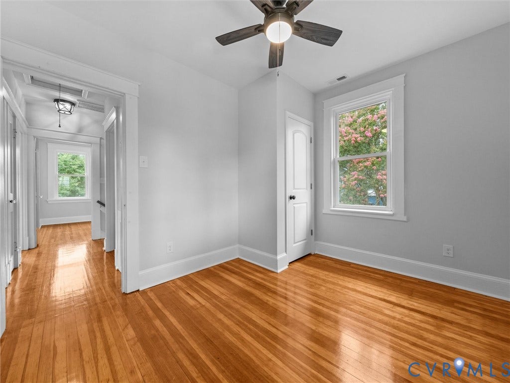 2911 Northumberland Avenue, Northside, Richmond, VA 23220 Room featuring polished wood flooring, a ceiling fan with integrated lighting, and white baseboards