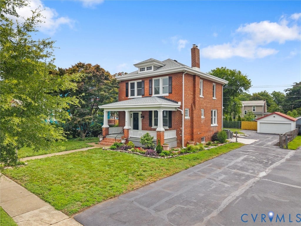 2911 Northumberland Avenue, Northside, Richmond, VA 23220 Traditional brick residence featuring a full-width covered porch with white columns and railing