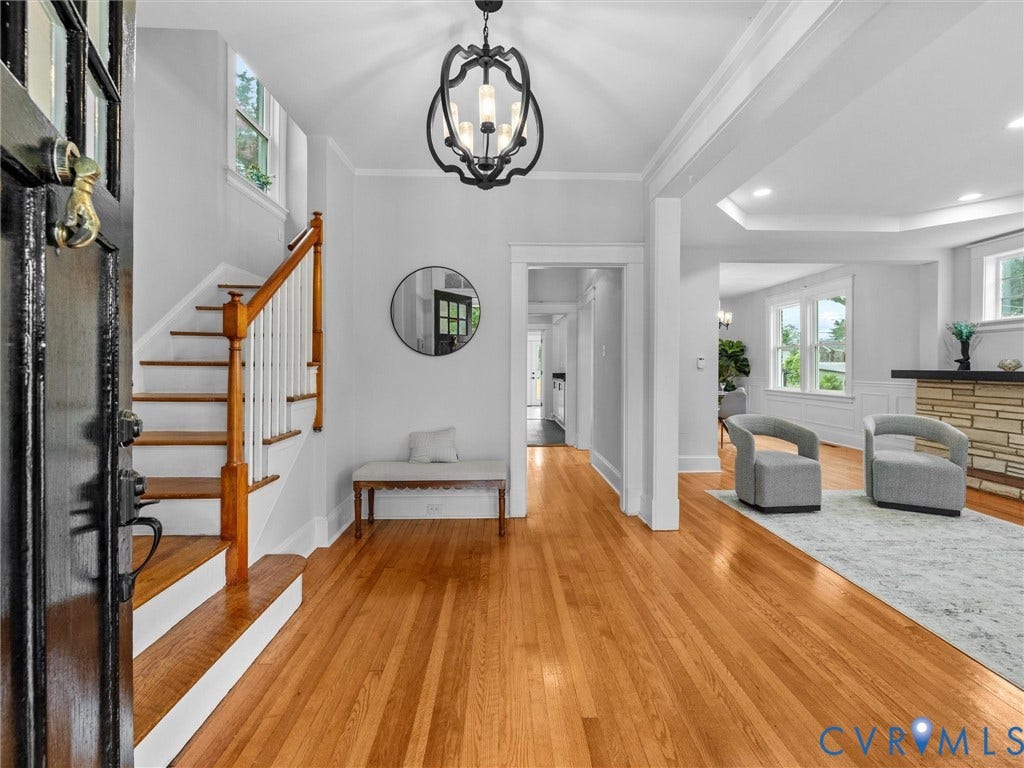 2911 Northumberland Avenue, Northside, Richmond, VA 23220 Bright entry foyer featuring wood-finish flooring and a staircase with a wood handrail