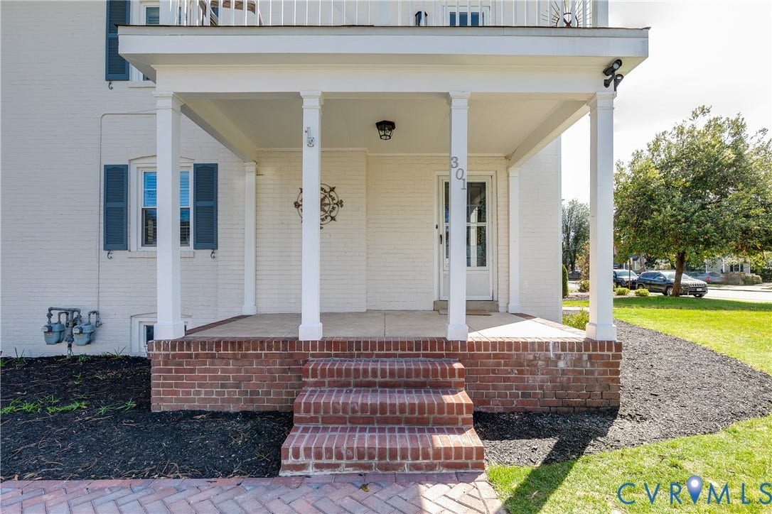 Unit 1 entry from Seneca, side porch