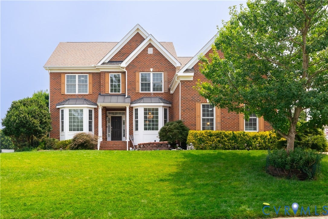 16814 Jennway Place, Moseley, VA 23120 Brick exterior featuring multiple gables, bay windows, and wood-finish shutters