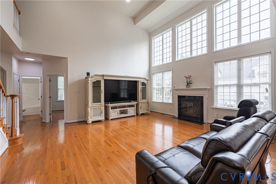 16814 Jennway Place, Moseley, VA 23120 Two-story living area featuring hardwood flooring