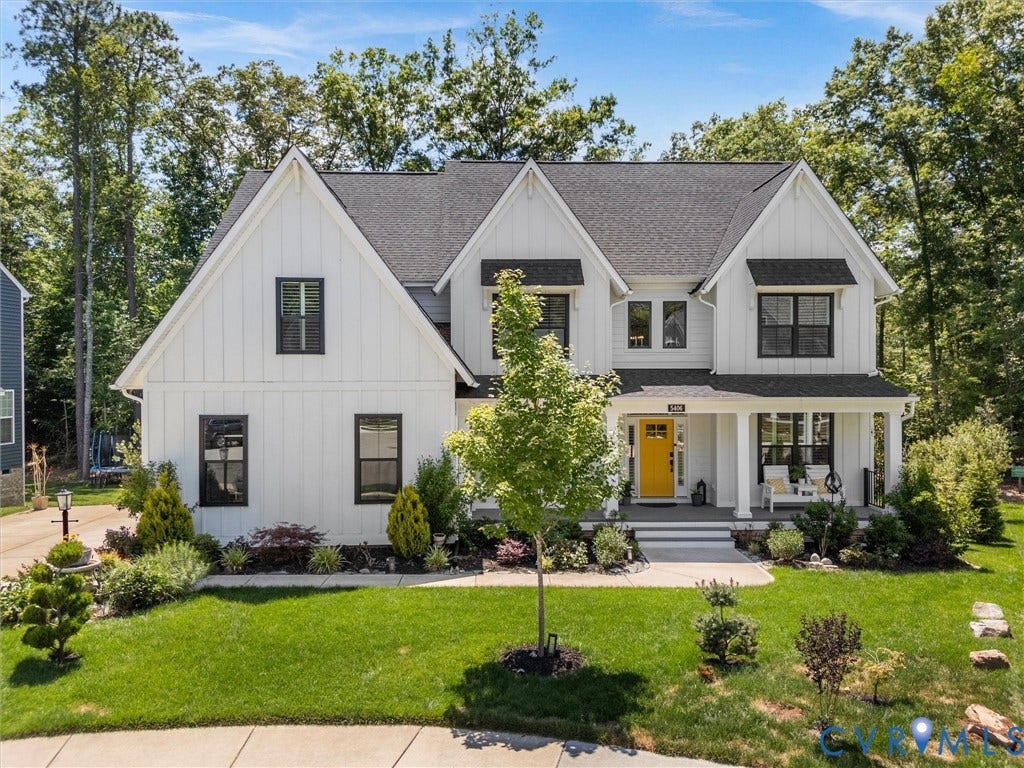 White board and batten exterior with black-framed windows