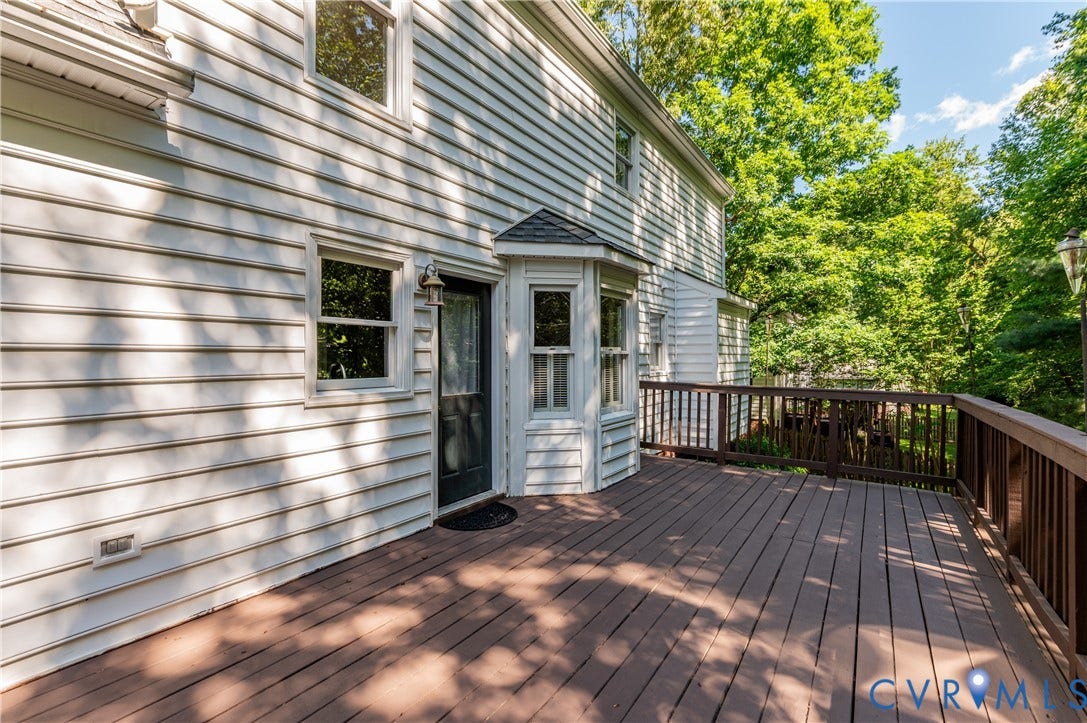 4419 Boones Bluff Way, Chesterfield, VA 23832 Expansive wood-finish deck with a full railing system