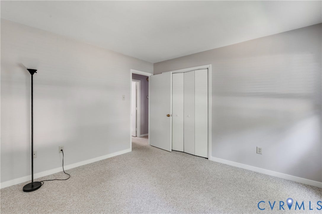 4419 Boones Bluff Way, Chesterfield, VA 23832 Light gray walls complement the neutral carpeting in this room