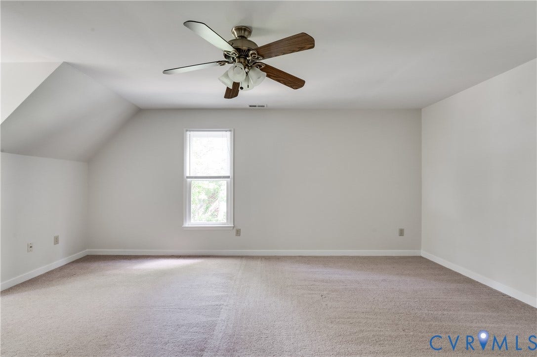 4419 Boones Bluff Way, Chesterfield, VA 23832 Carpeted room with a ceiling fan featuring wood-finish blades and an integrated light fixture