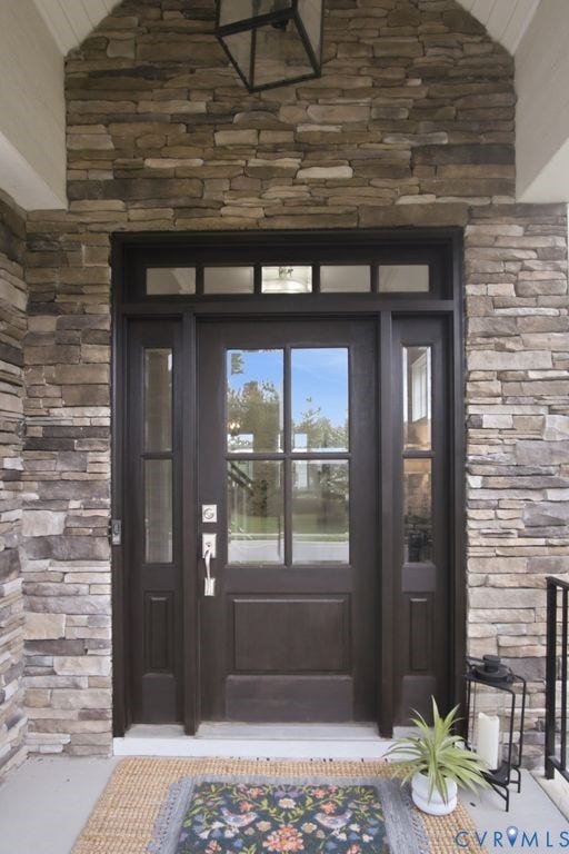 6991 Carden Park Drive, Carden Park, Moseley, VA 23120 Stone veneer facade with a covered entry