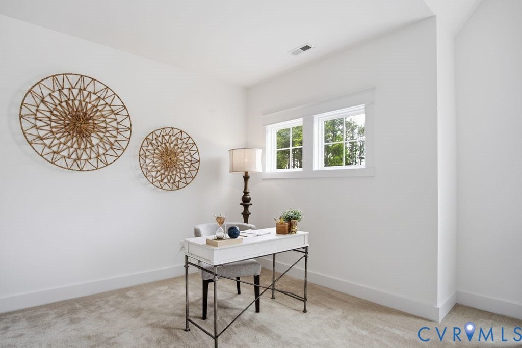 6991 Carden Park Drive, Carden Park, Moseley, VA 23120 Bright room featuring a double window with white trim, light neutral-toned carpet, and clean white walls