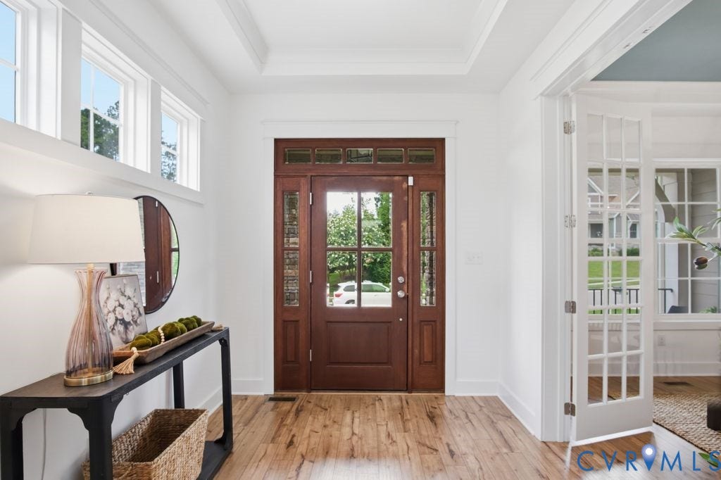 6991 Carden Park Drive, Carden Park, Moseley, VA 23120 Entry foyer featuring a wood-finish front door with glass panels and sidelights