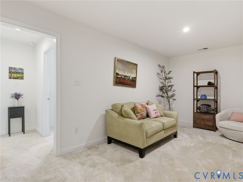 9237 Cerulean Place, Richmond, VA 23238 An open loft space designed for whatever your life needs, complete w/plush carpeting & endless possibilities. Whether its a cozy lounge, home office, or playroom, this second-floor loft offers flexible living.