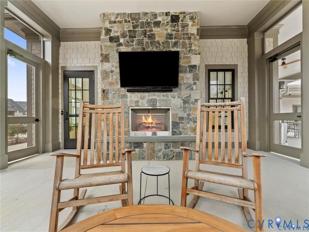 9237 Cerulean Place, Richmond, VA 23238 Relax fireside on the screened porch your go-to spot for games, shows, and easy living.