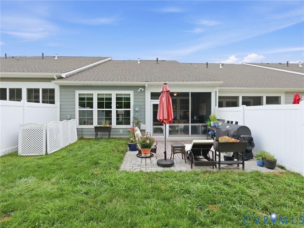 9237 Cerulean Place, Richmond, VA 23238 Picture evenings on the patio, weekends grilling, and peaceful views from the porch, this fenced-in, versatile backyard makes it all possible.