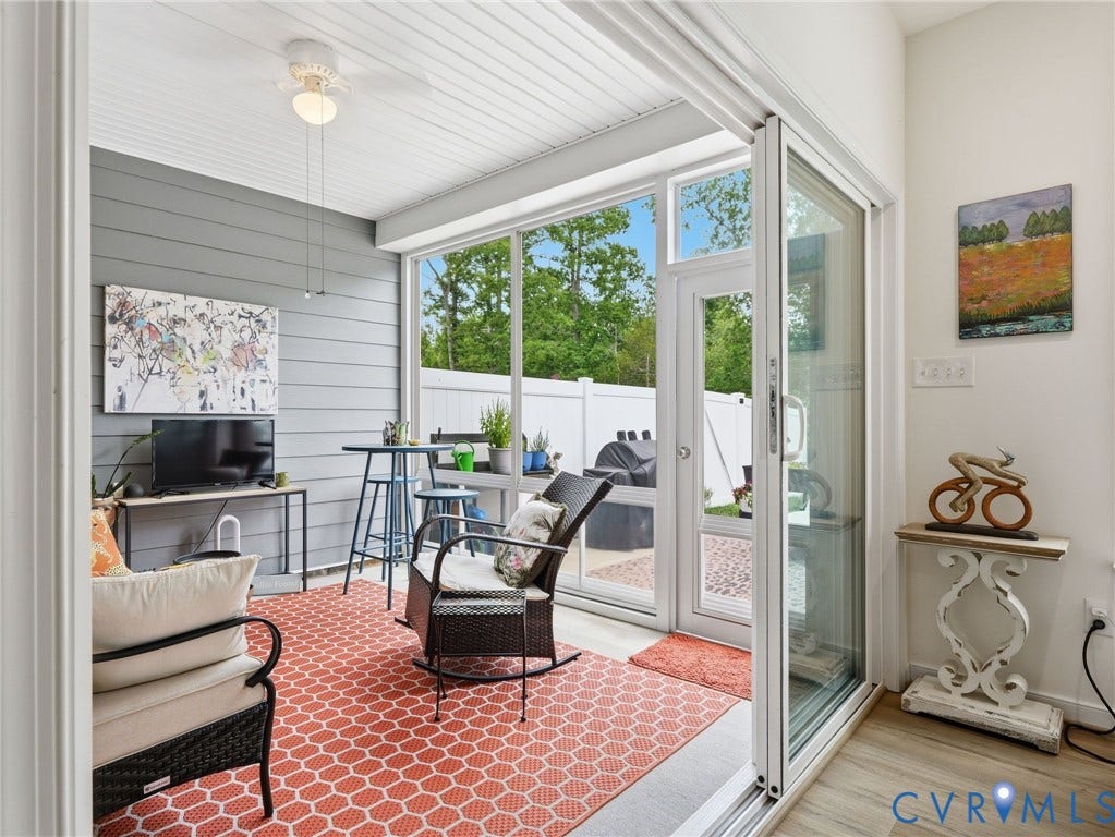 9237 Cerulean Place, Richmond, VA 23238 Glass doors open onto itself to create a larger opening. Creates an expanded living space. New ceiling fan. Porch is both glassed & screened for most any season. A space made for living well...